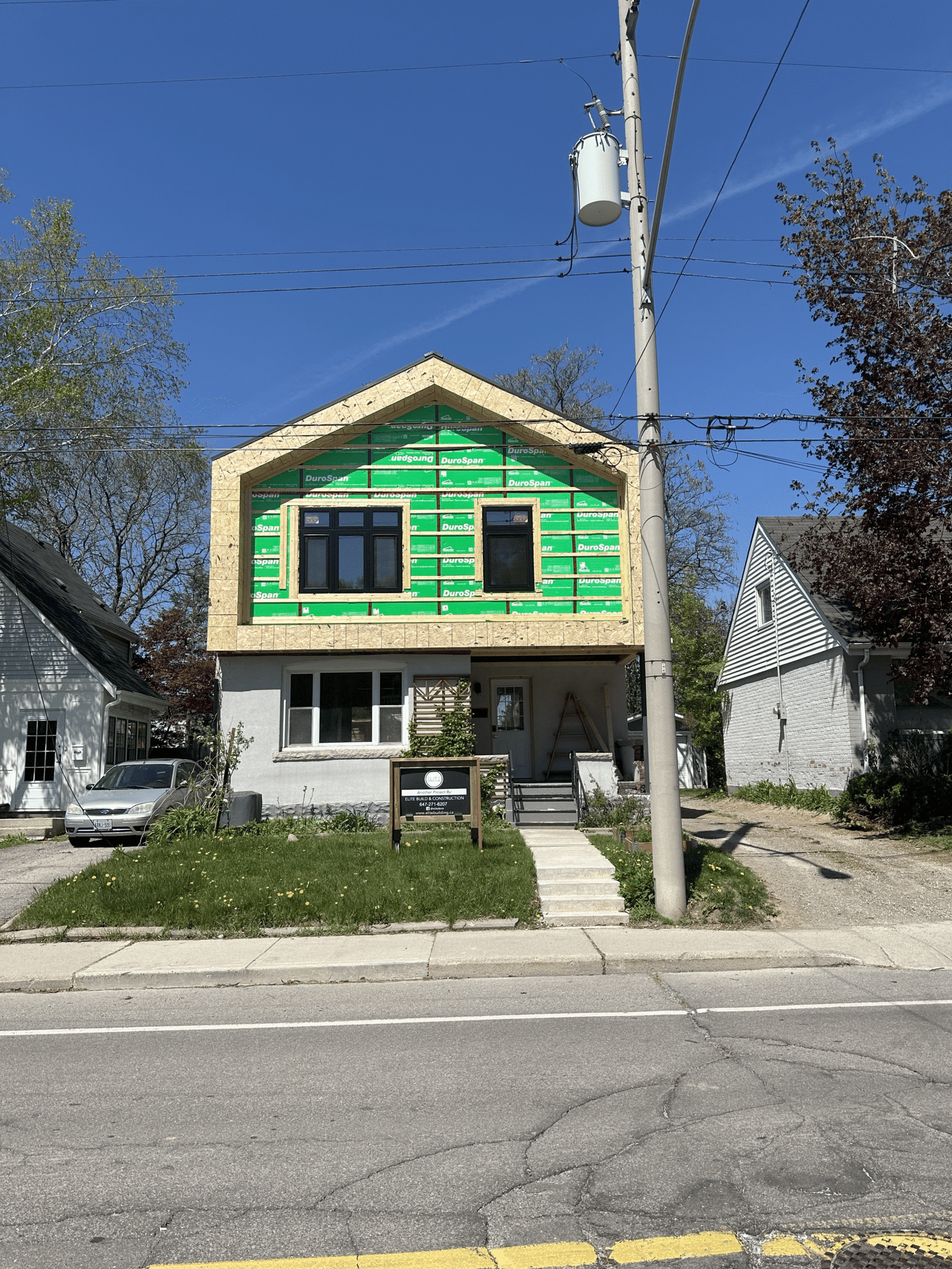 Crane-assisted second storey home addition in Hamilton