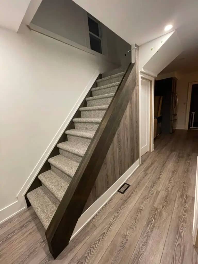 Modern basement staircase renovation with stylish railings